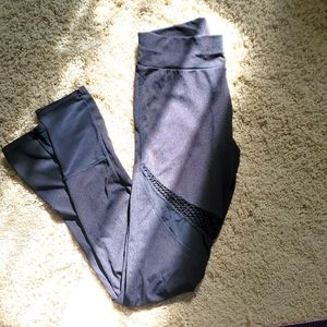 Leggings with mesh and paneling cut outs